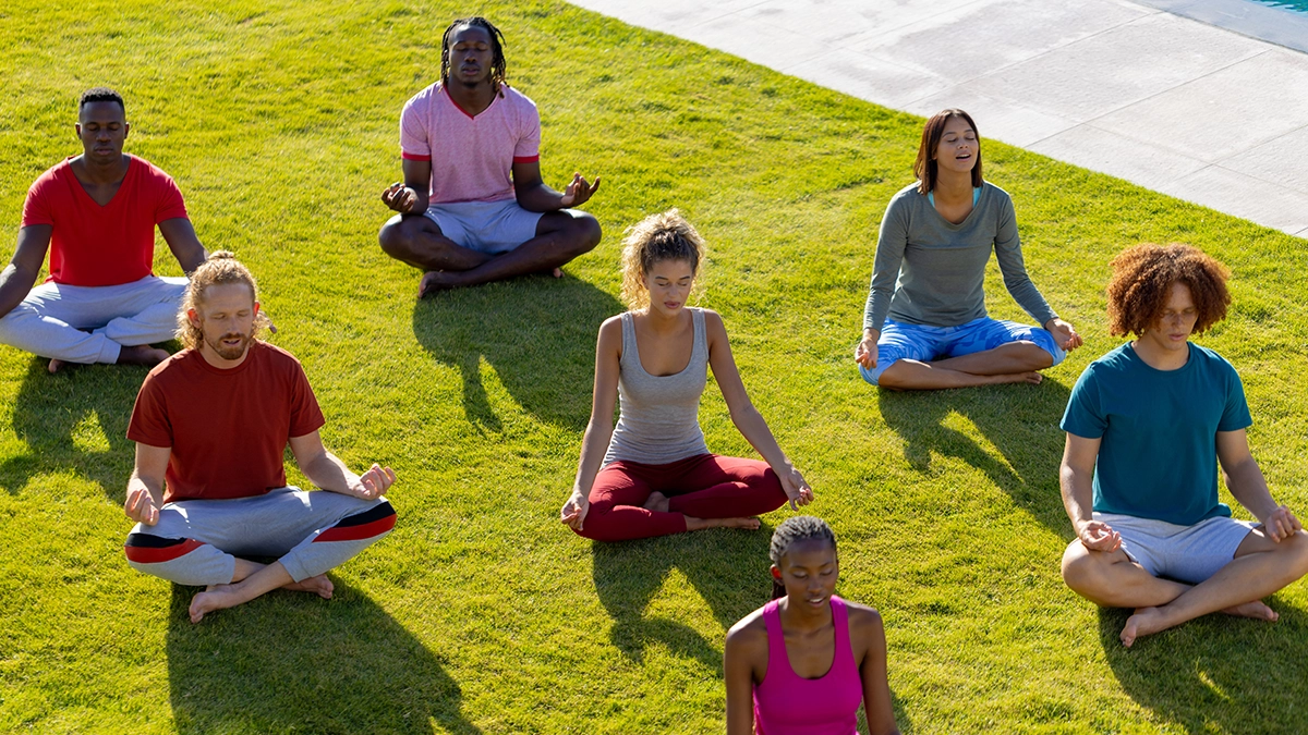 Group of friends doing meditation for anxiety Winter Park FL