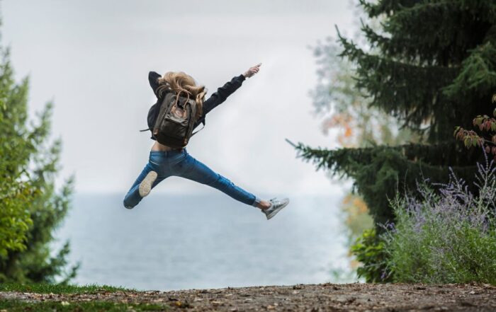 Girl Jumping in the Forest